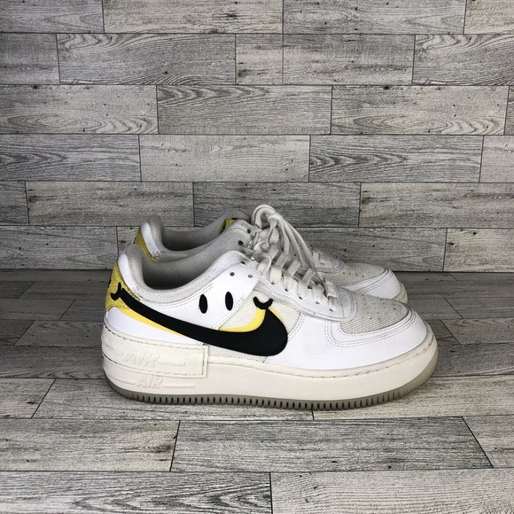 Nike Shoes - Nike White and Black Athletic Shoes with Yellow Accents